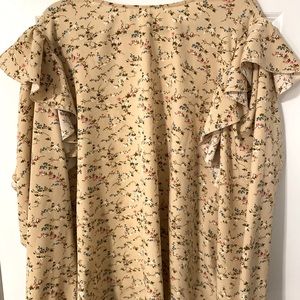 Tan flower styled blouse with high neck